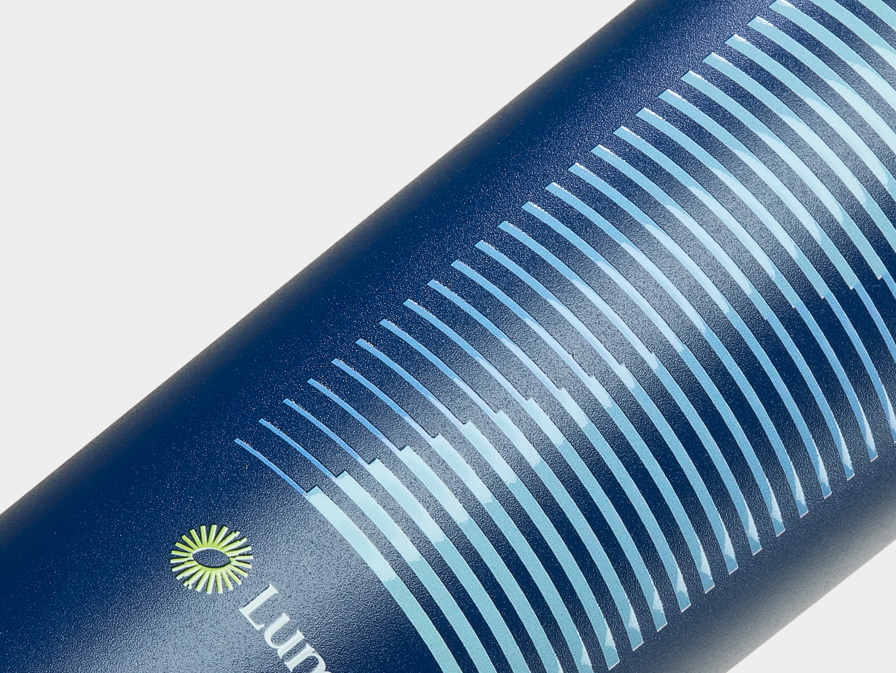 Detail image of custom branding on blue water bottle.