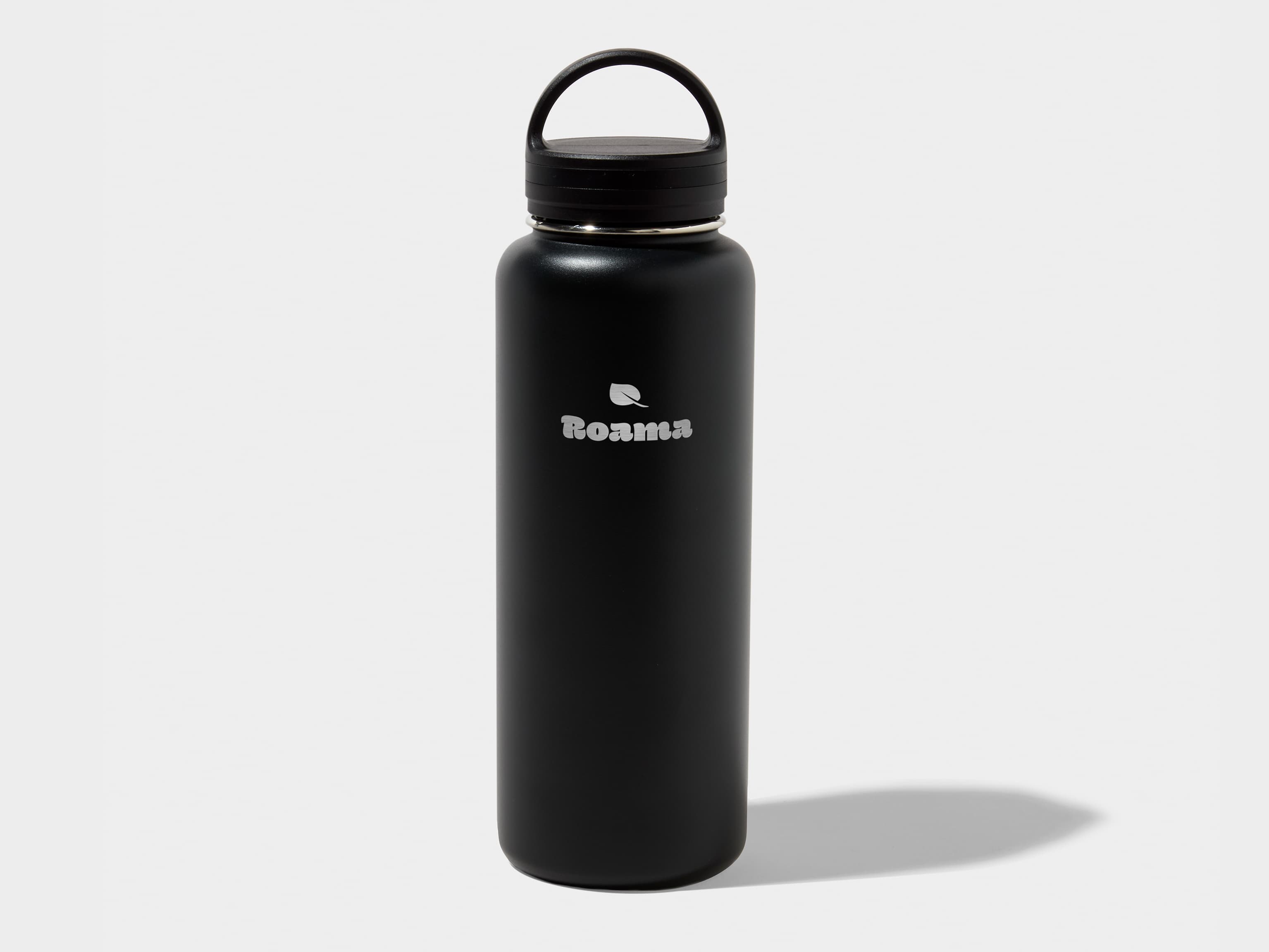 An extra large water bottle in jet black with custom engraving.