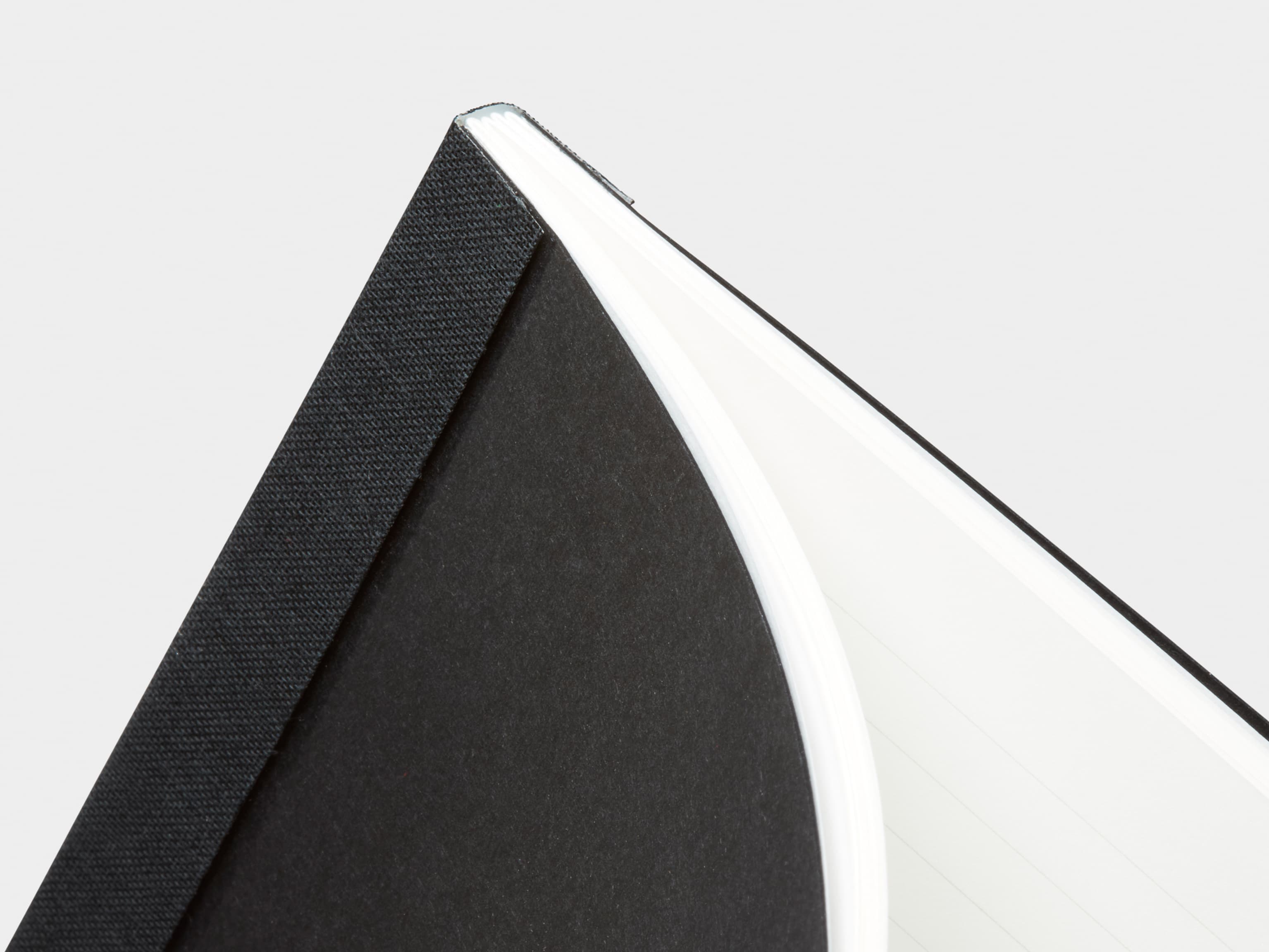 Close-Up of Black Tape Bound Notebook in A4 