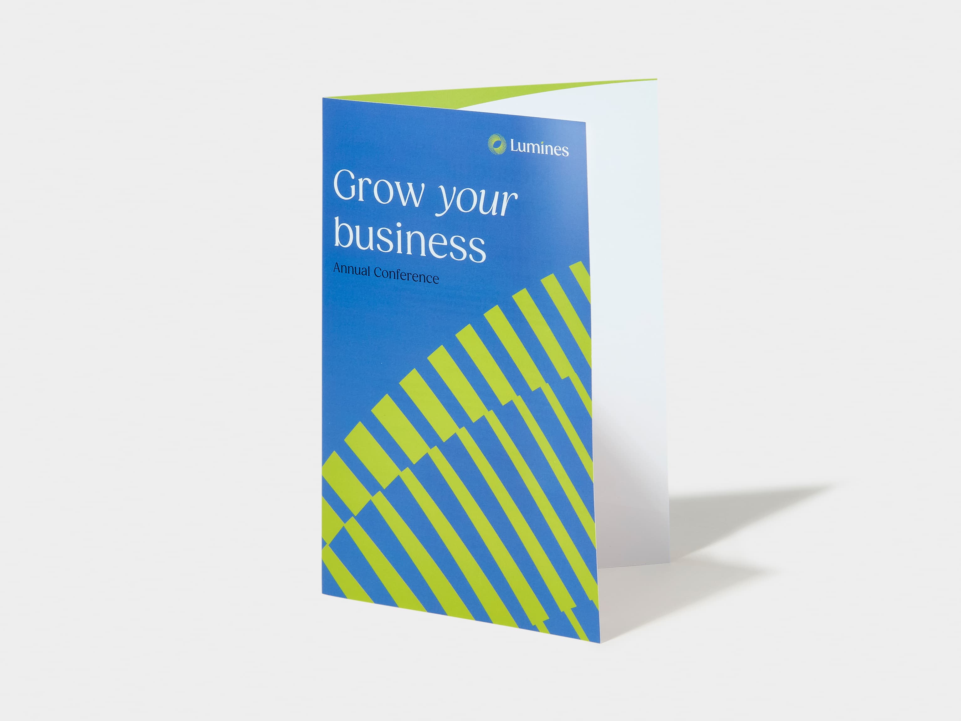 A bi-fold brochure in gloss paper with printed customisation.