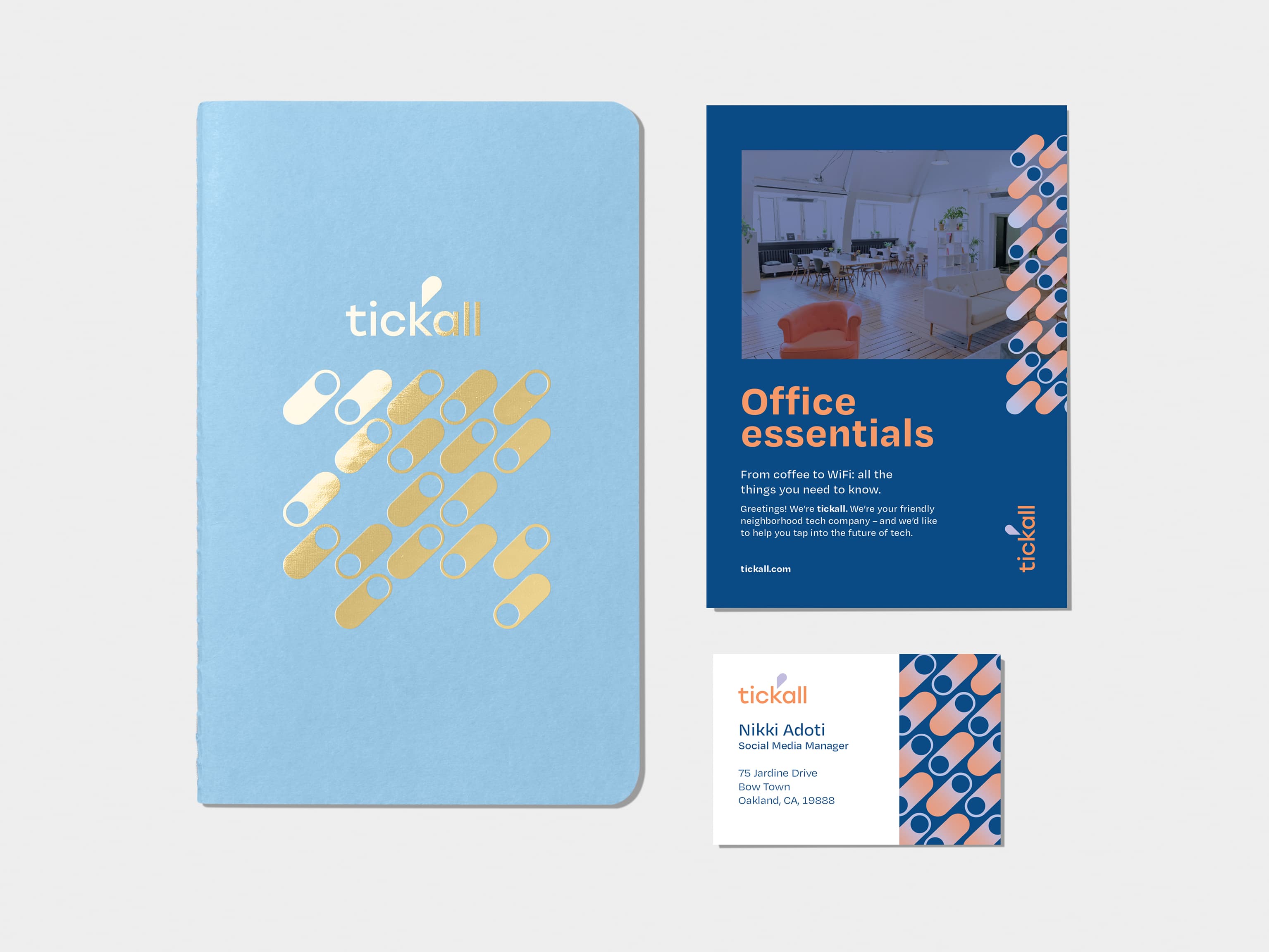 A flyer on the top left corner. Steel Blue soft cover journal with silver foil pattern in top right corner. A business card on bottom left corner. A mini card on bottom right corner.