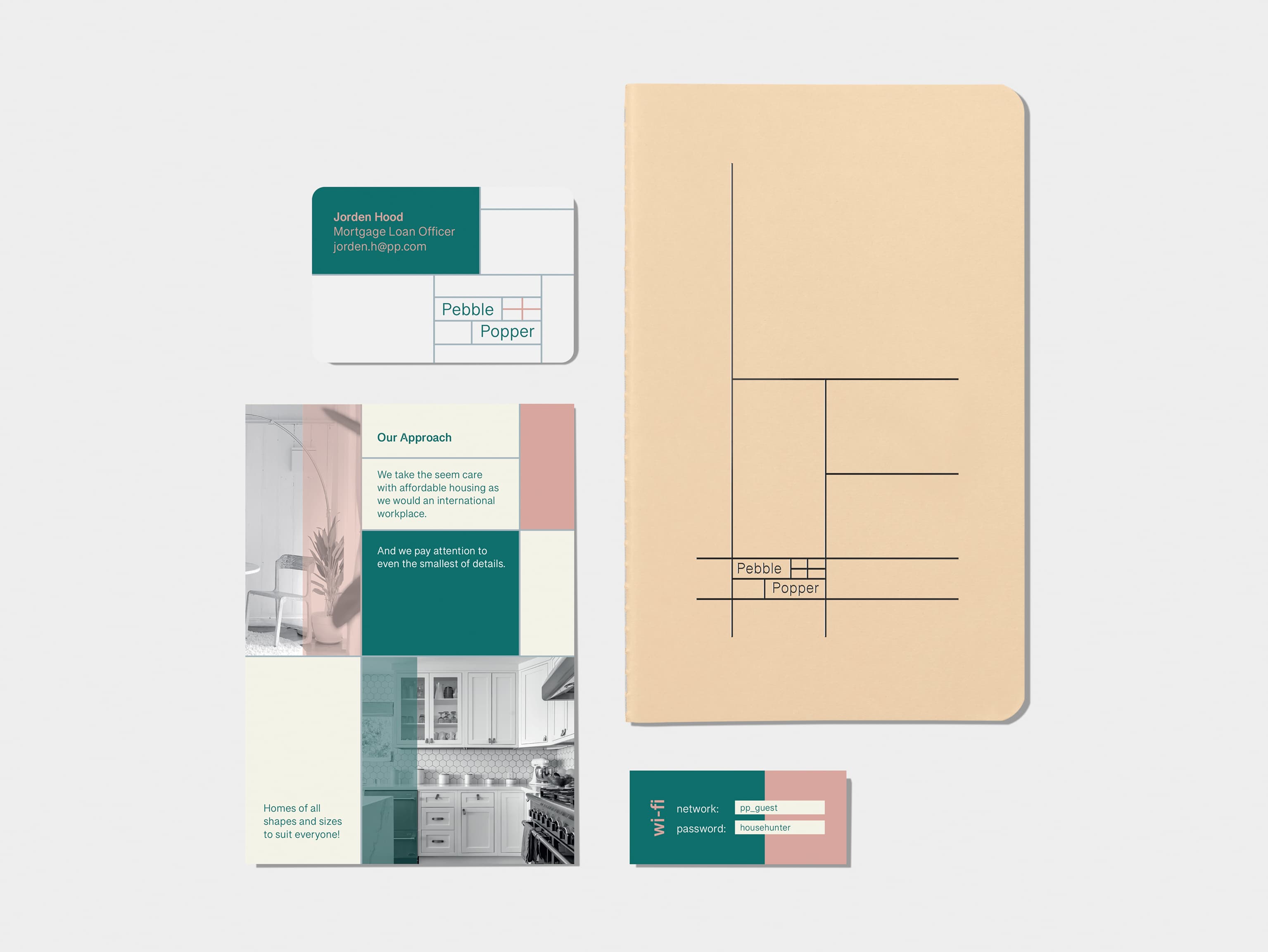 A flyer on the top left corner. Tan soft cover journal with silver foil pattern in top right corner. A business card on bottom left corner. A mini card on bottom right corner.