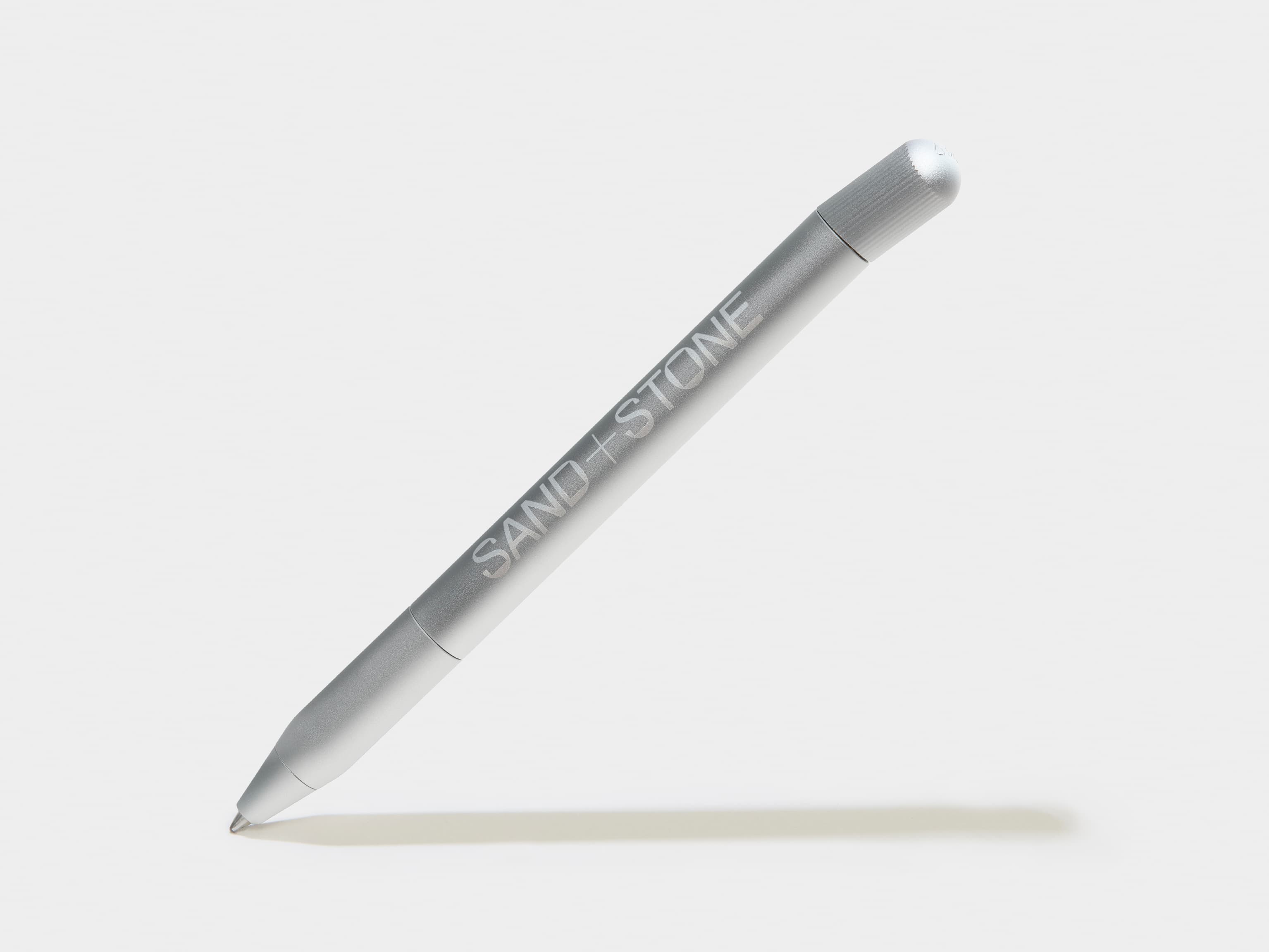 A aluminium pen with custom white branding.