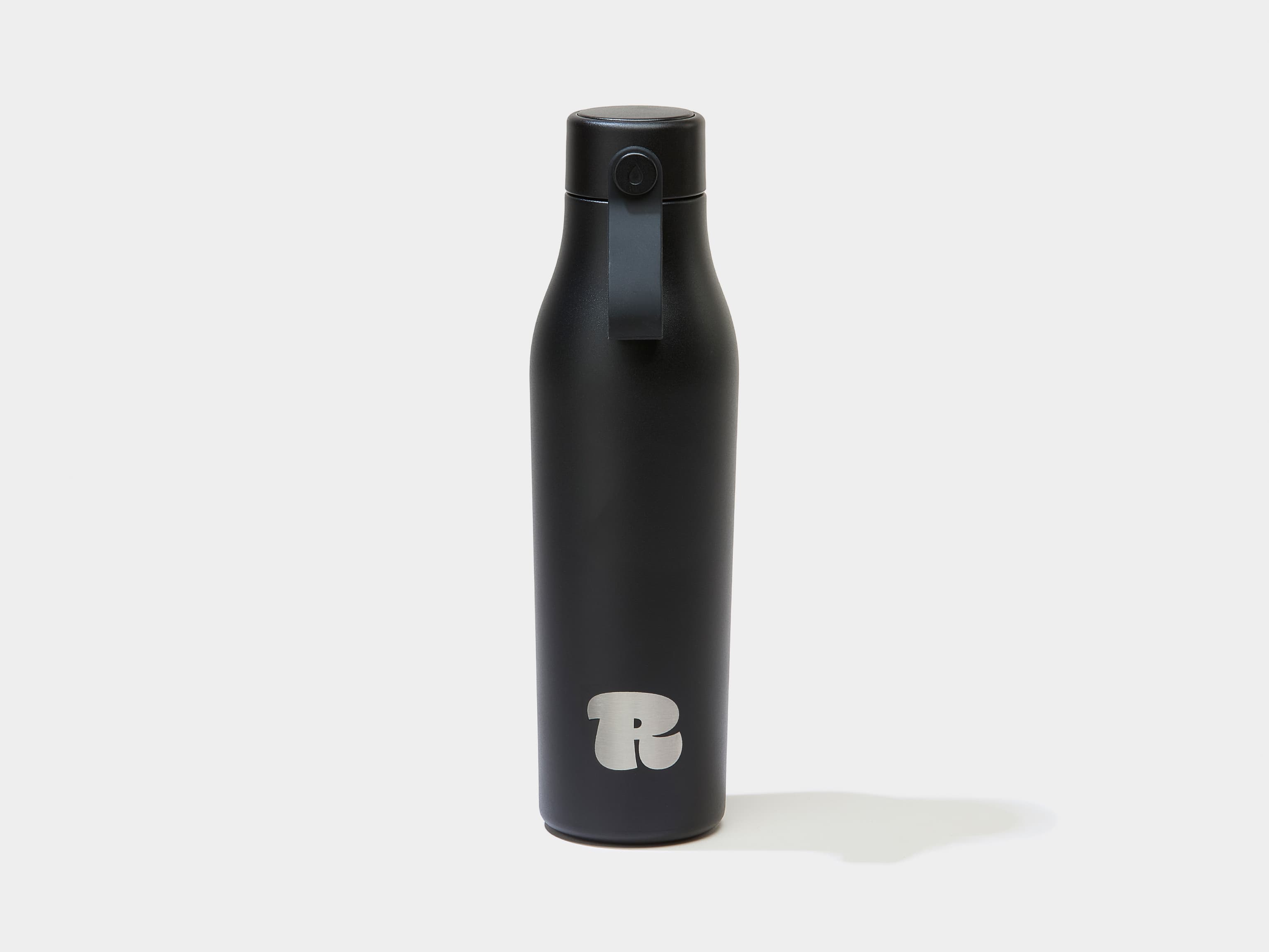 A jet black water bottle with silver custom branding.