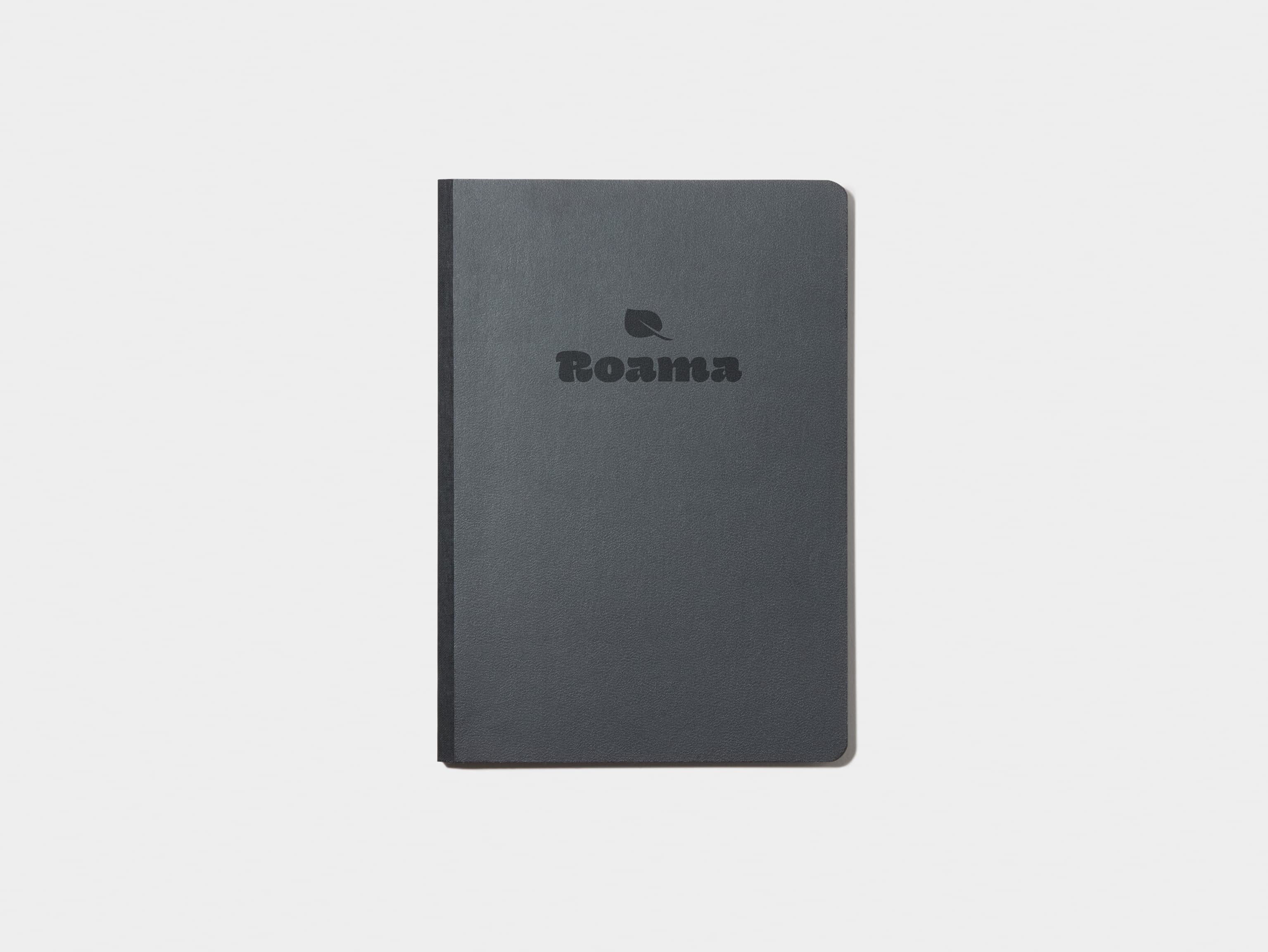 A jet black softcover notebook with deboss customisation.