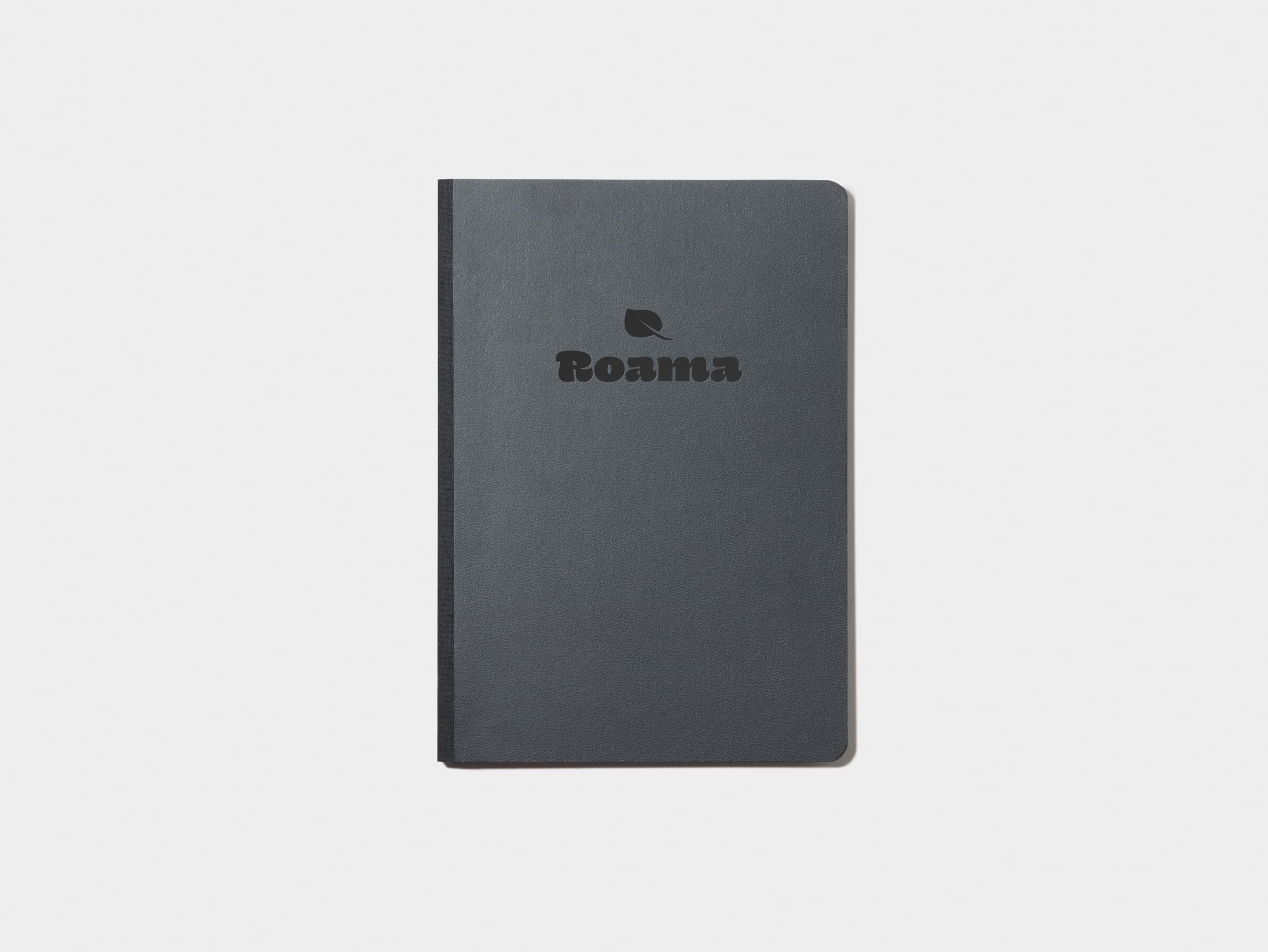 A jet black softcover notebook with black foil customisation.