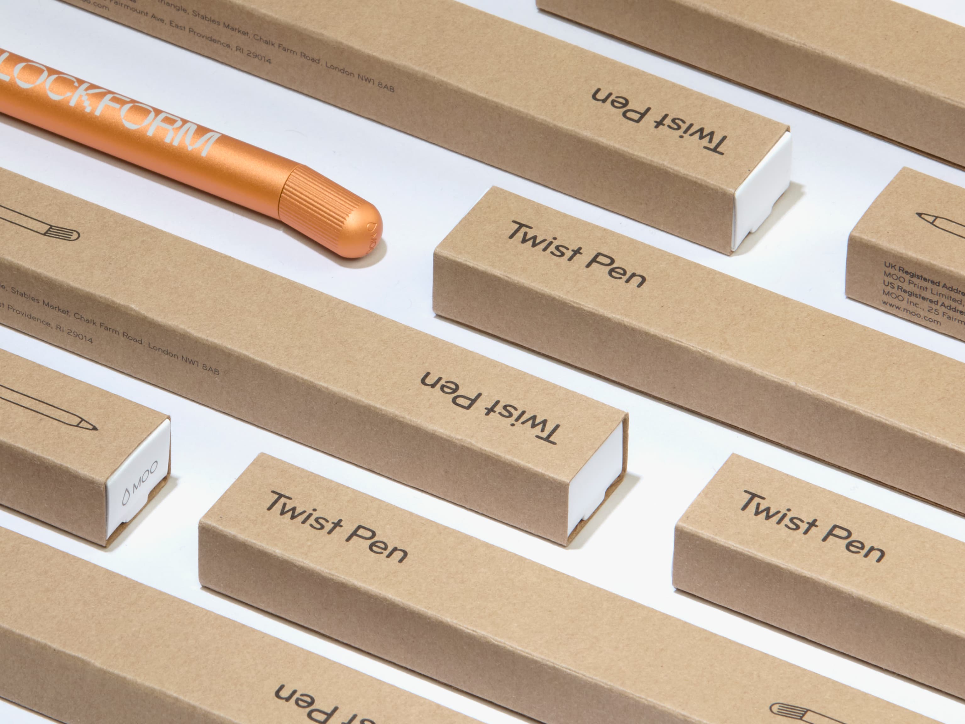 MOO Twist Pen packaging with a custom orange pen.