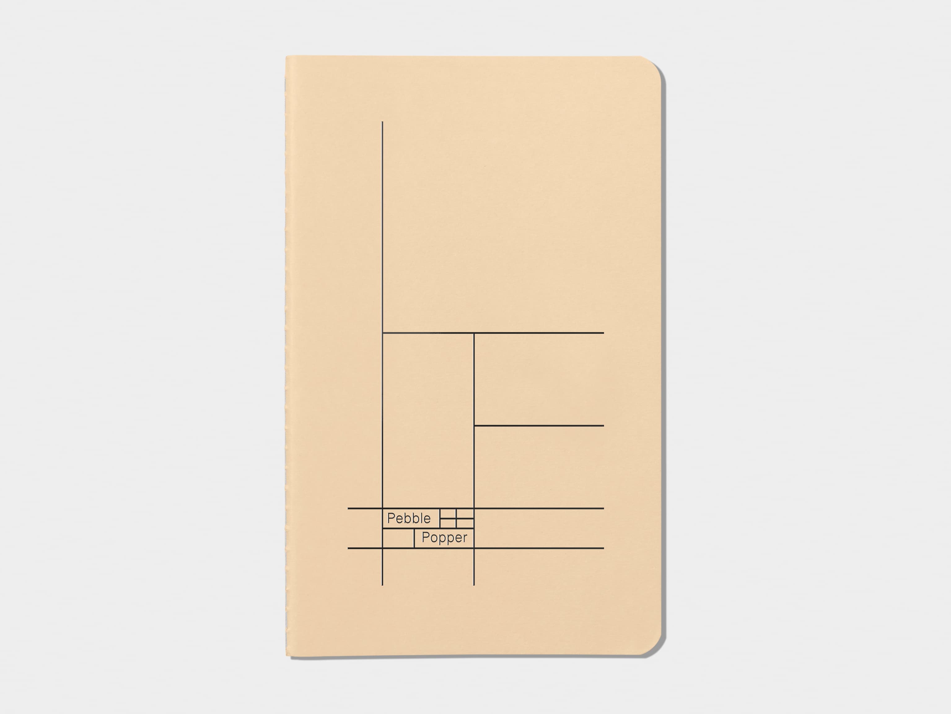 Tan soft cover journal with black foil pattern