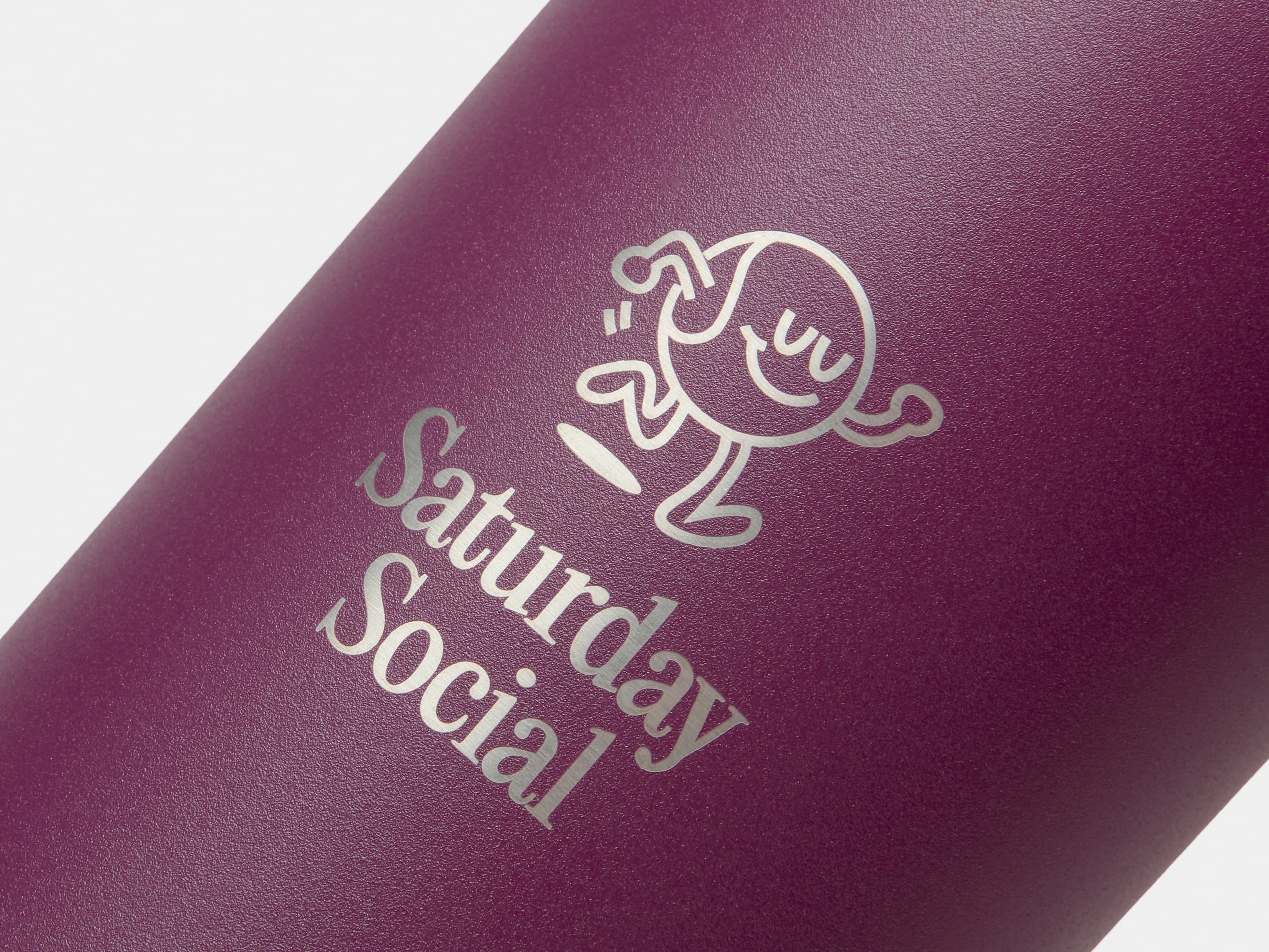 A close up image of the engraving customization on a mulberry MOO water bottle.