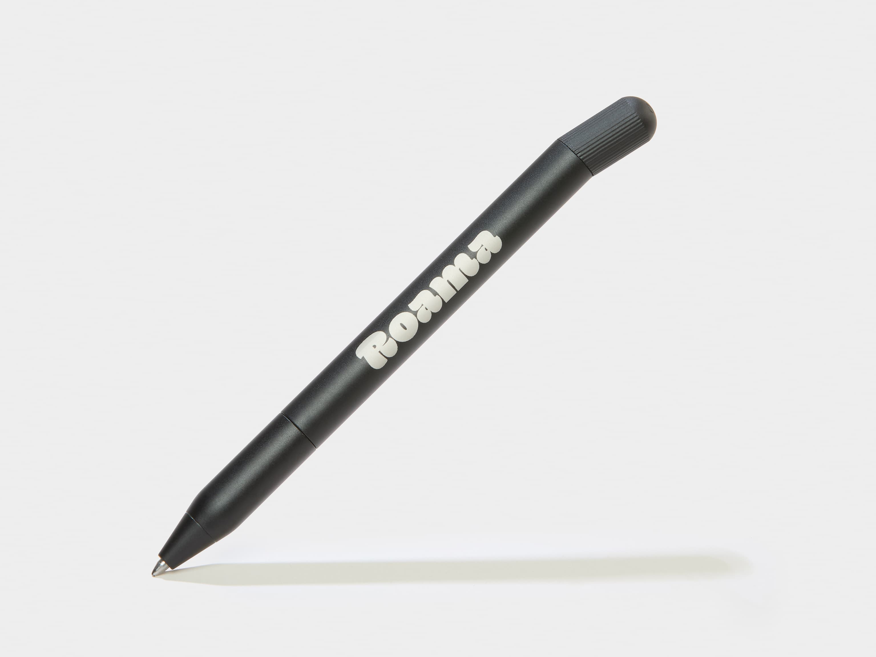 A black pen with custom white branding.