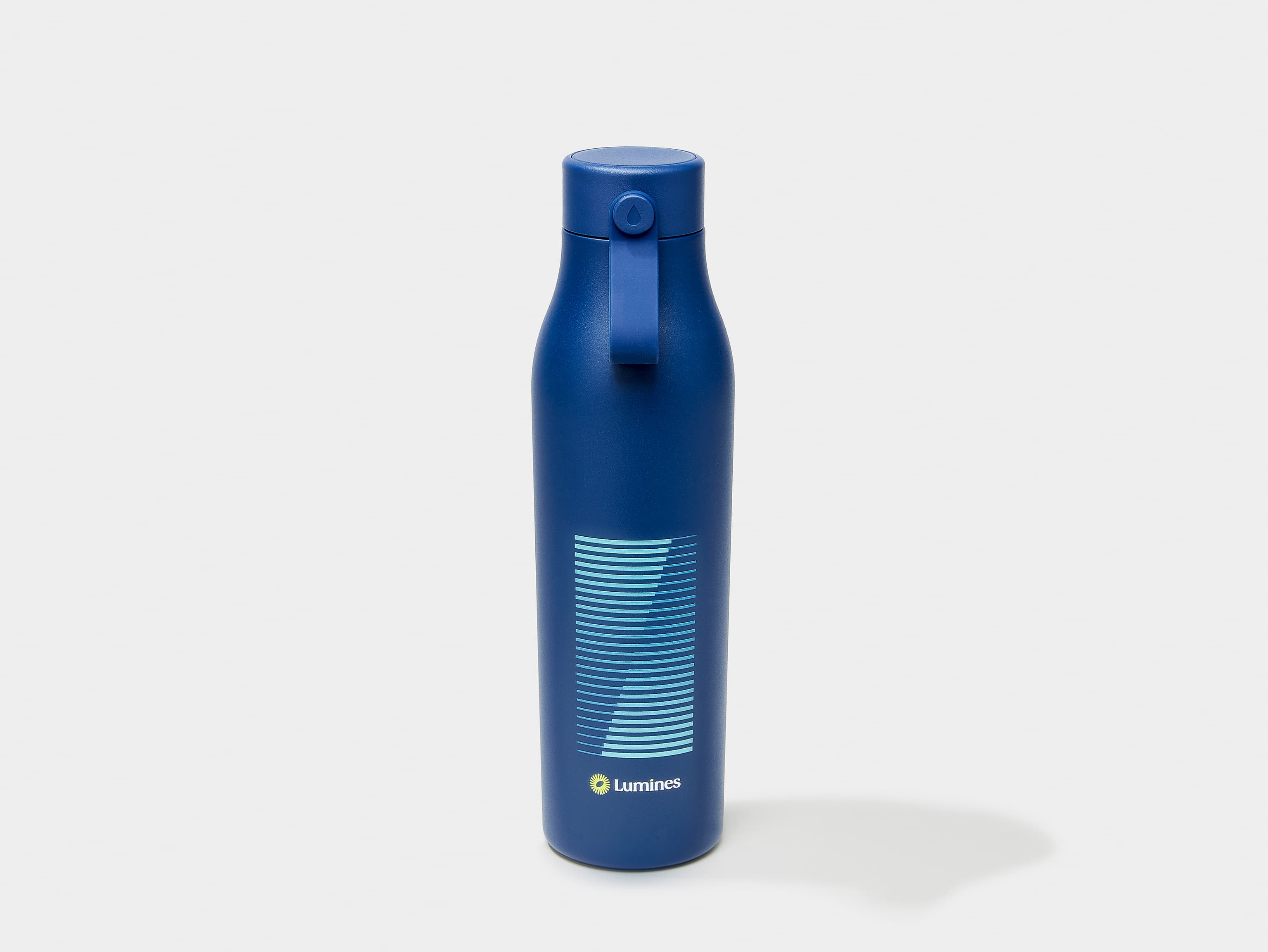 A midnight blue MOO water bottle with custom printing.