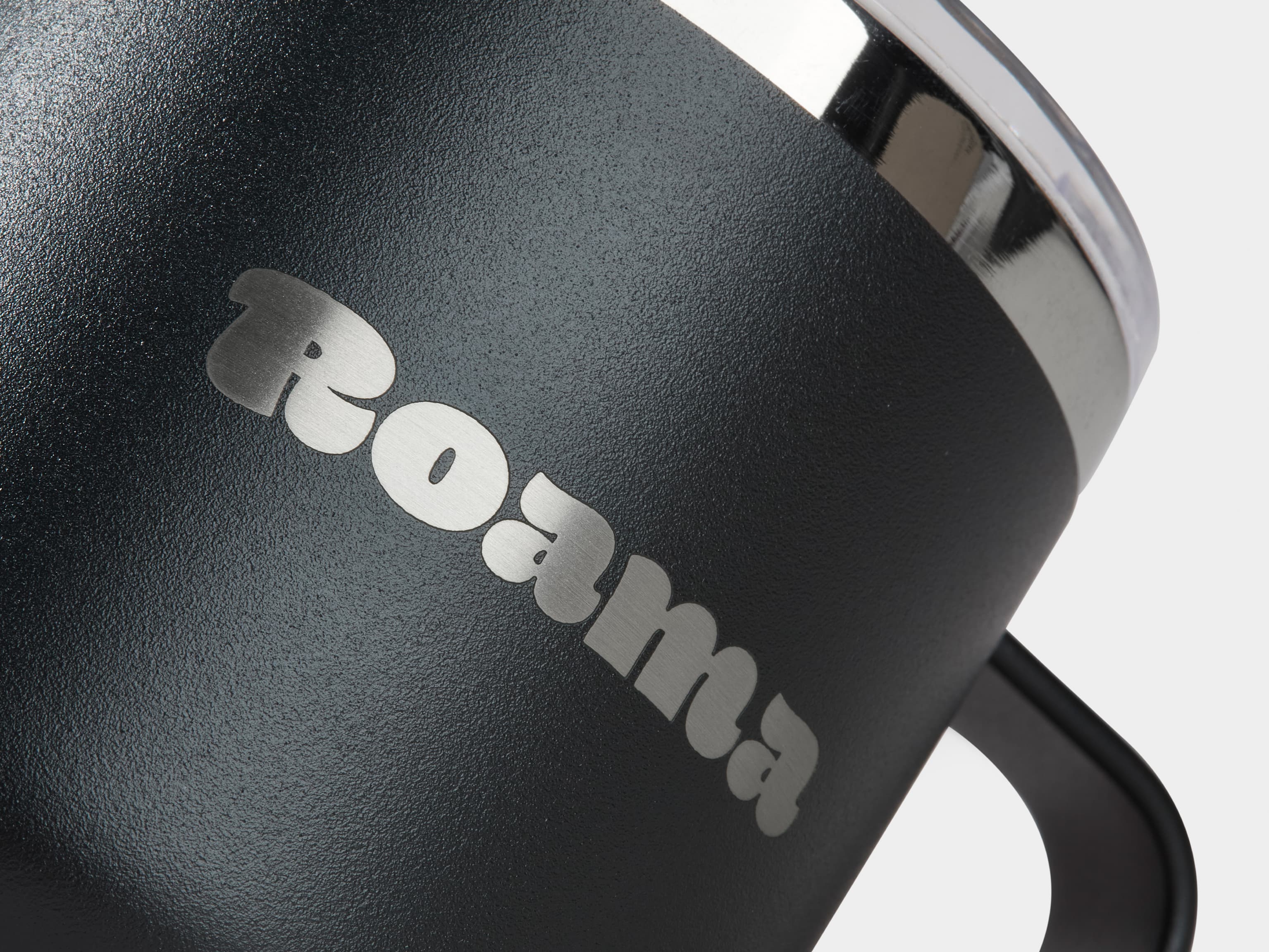 A close up image of customised branding on a black insulated mug.