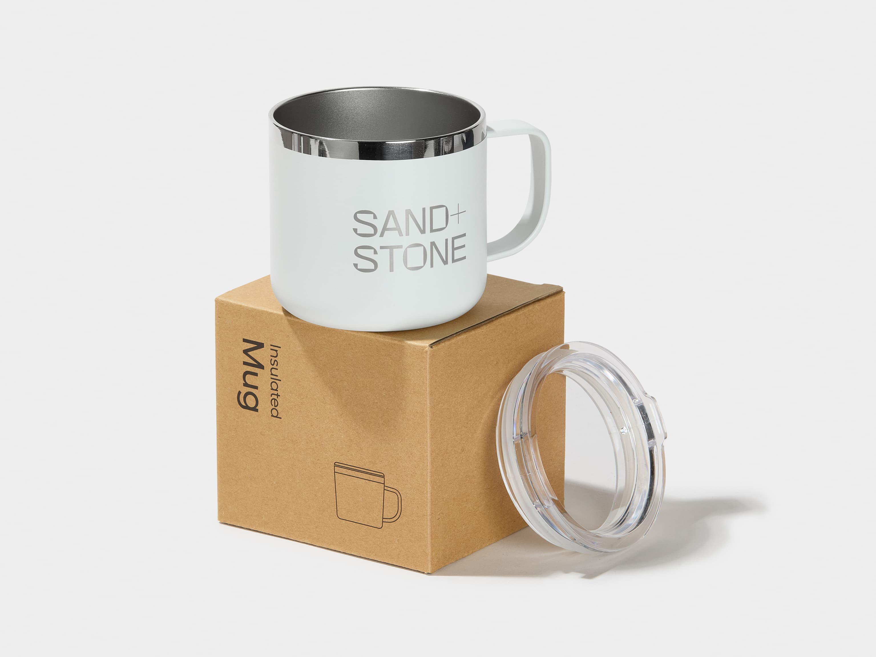 A customised cloudy grey insulated mug placed on top of packaging.