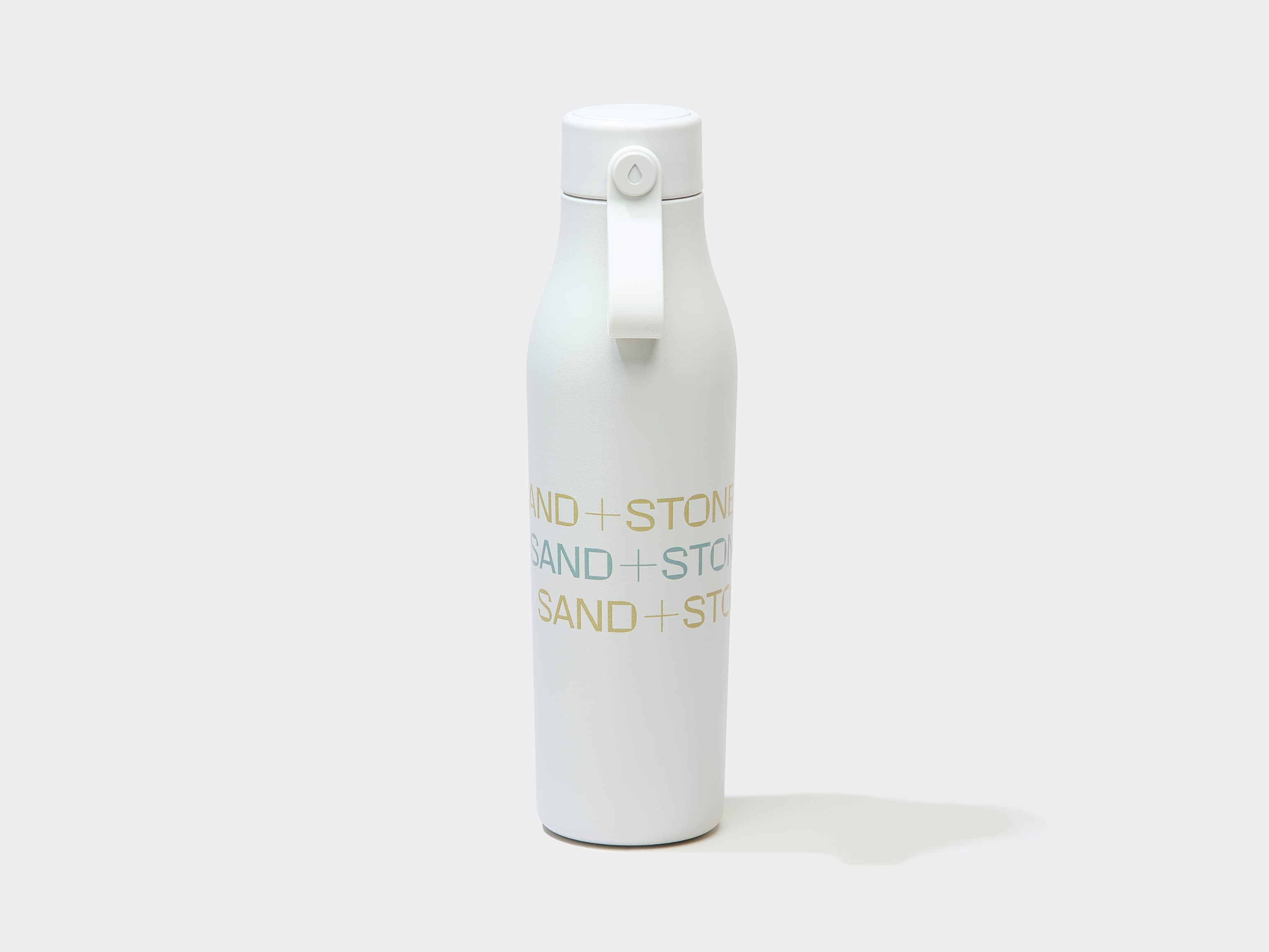 Cloud grey water bottle with custom gold and blue branding.