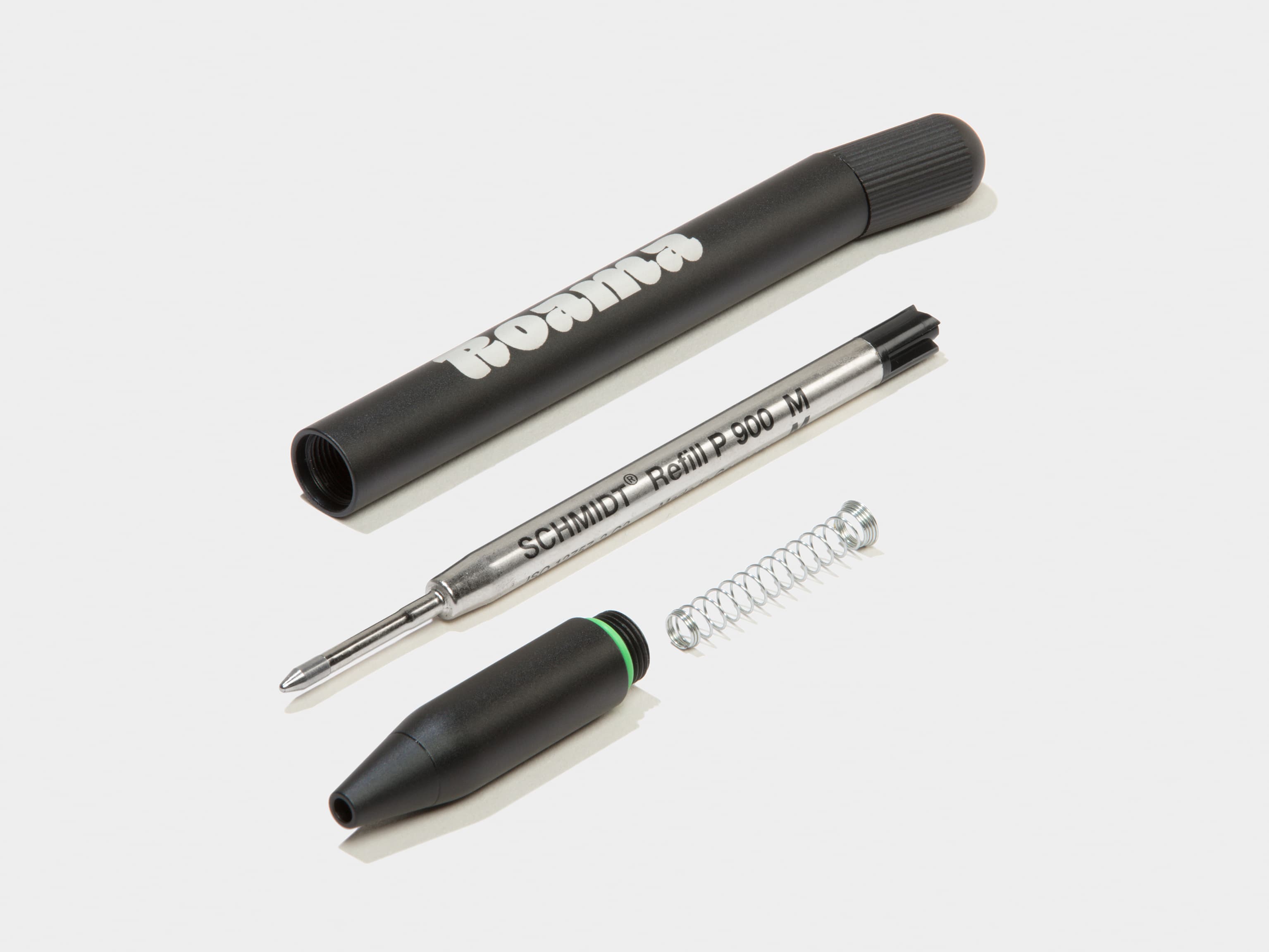 A disassembled custom black pen.