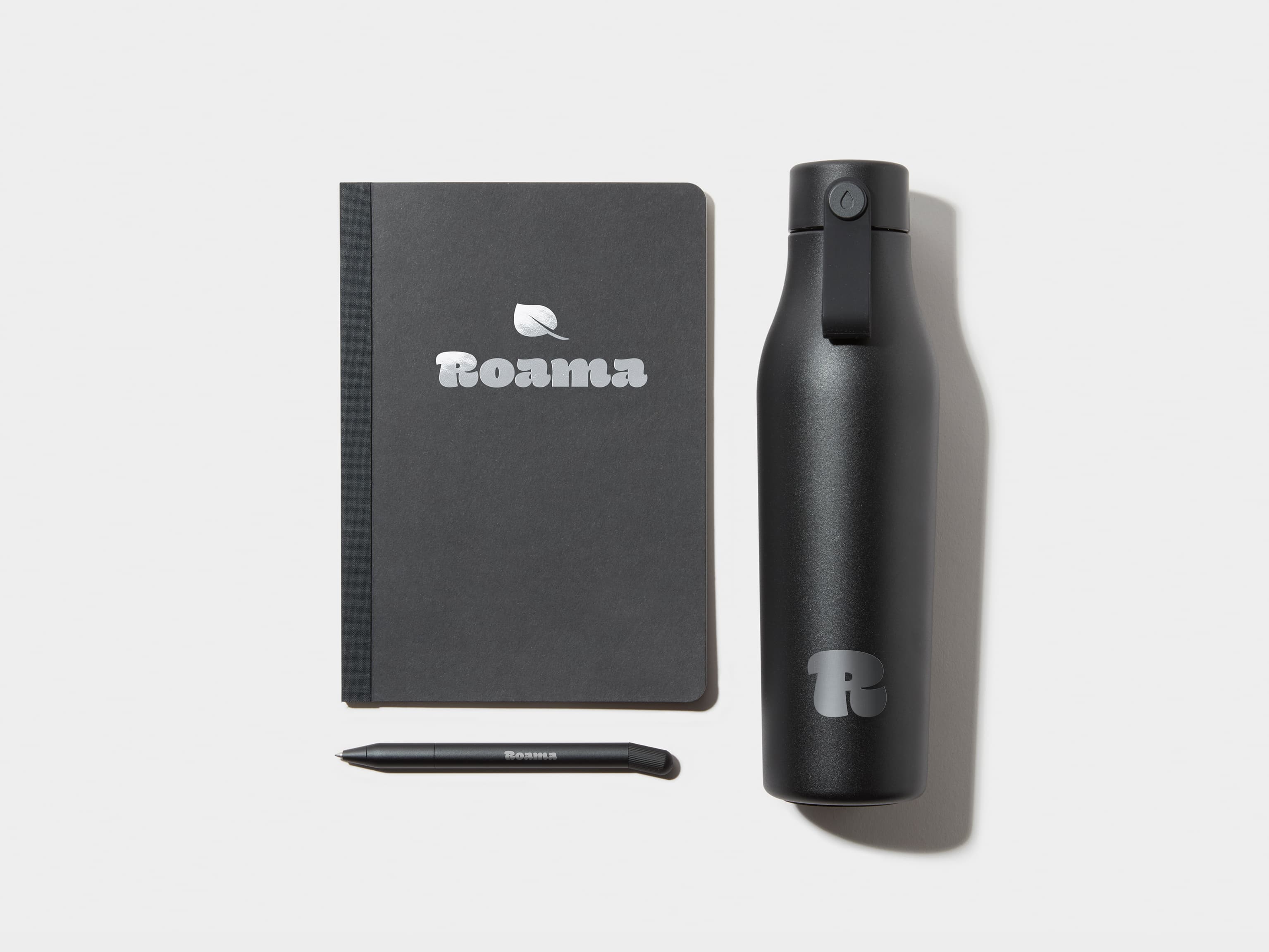 Black Tape Bound Notebook, Black Water Bottle and Black Pen 