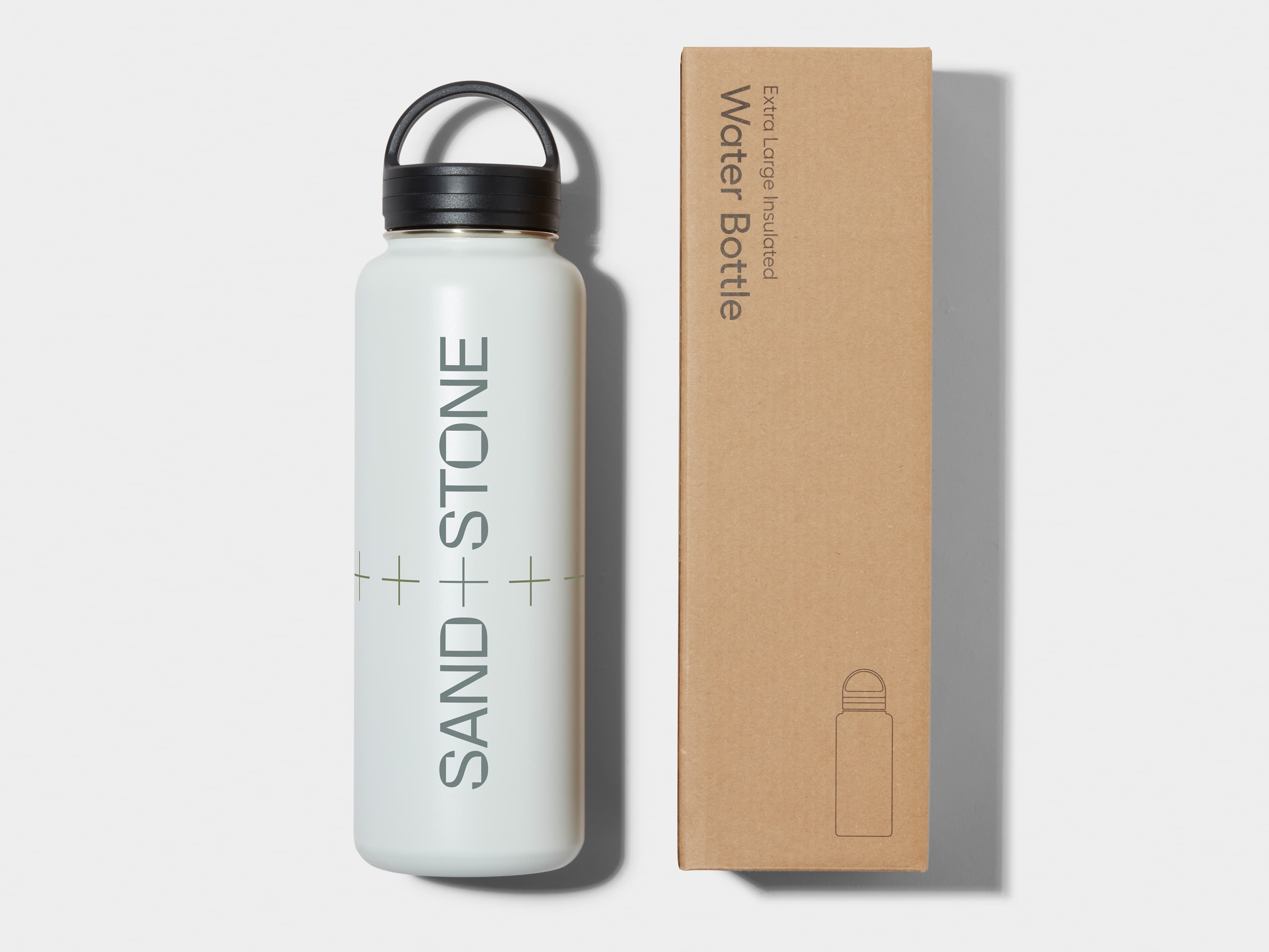 XL Insulated Water Bottle in Cloudy Grey with 360 wrap printing customisation next to its packaging