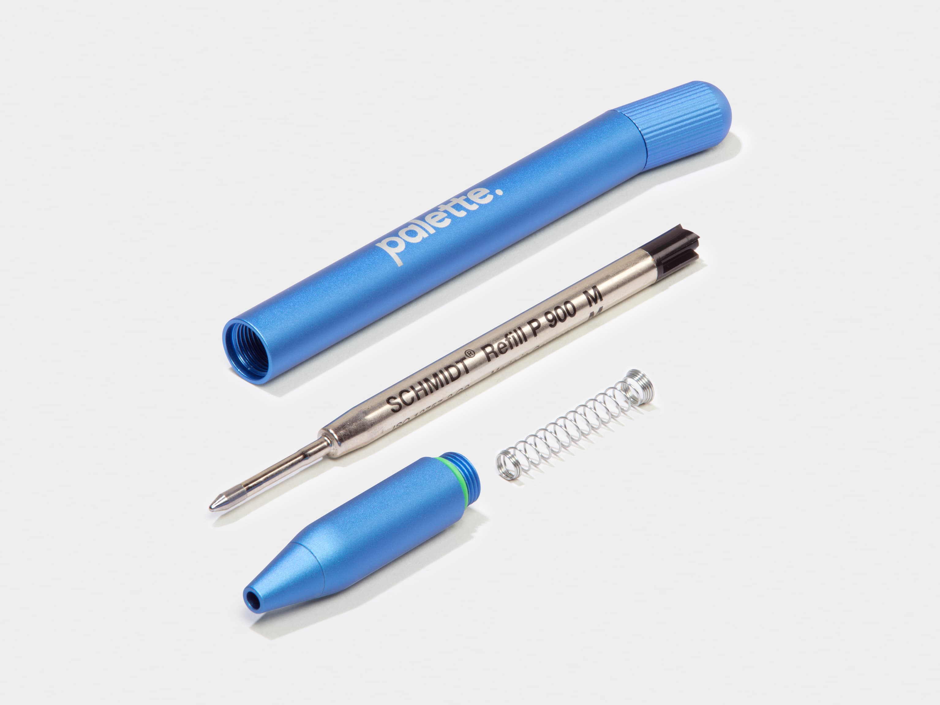 A disassembled custom blue pen.