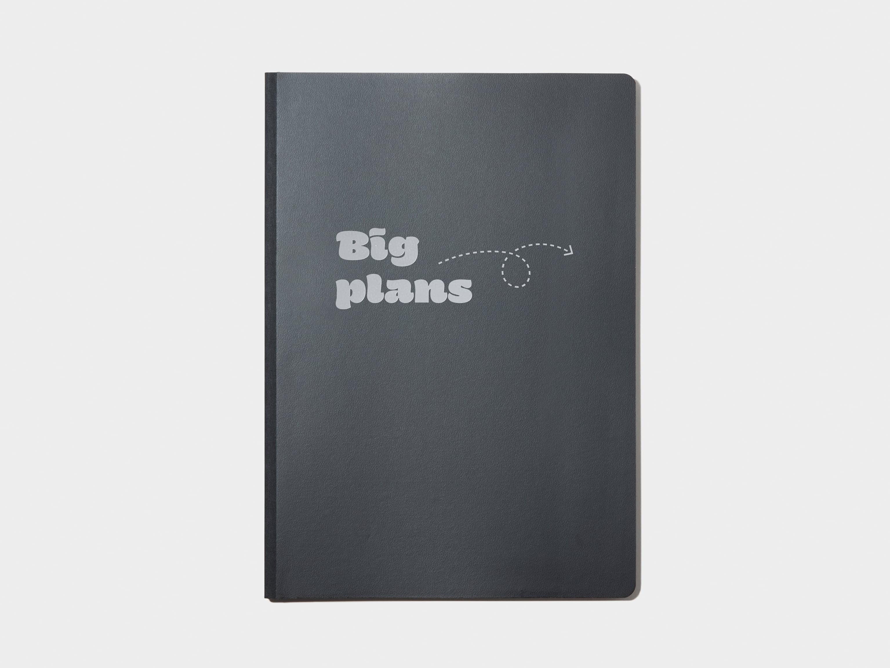 A black softcover with custom branding in silver foil.