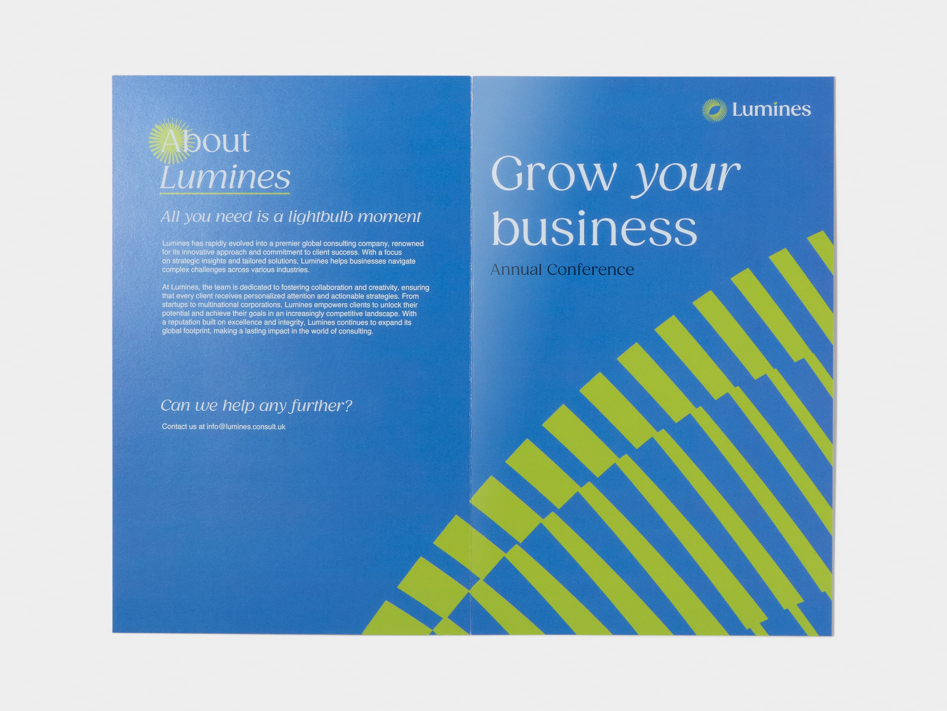 A gloss bi-fold brochure laid out flat.