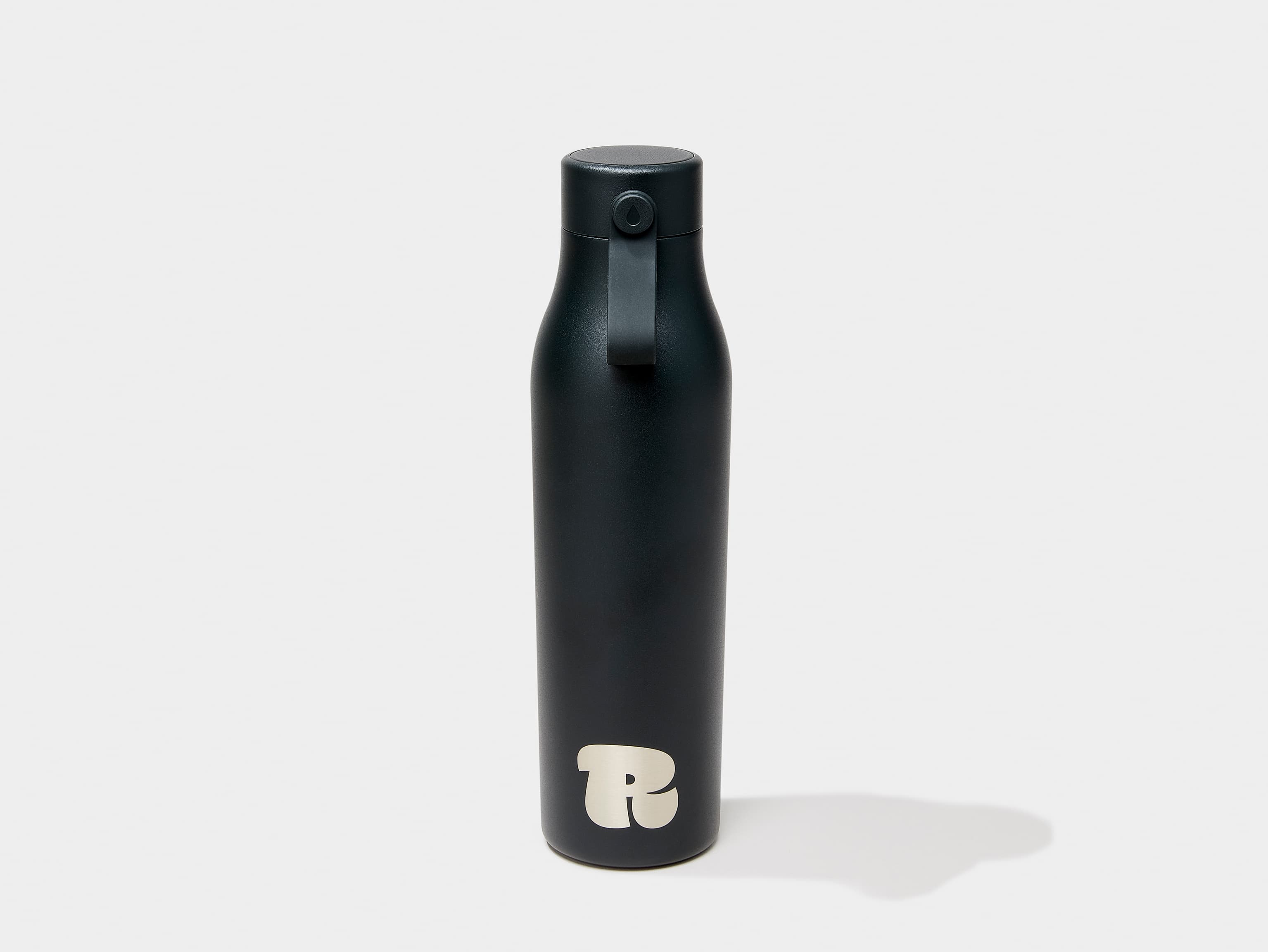 A jet black MOO water bottle with custom engraving.