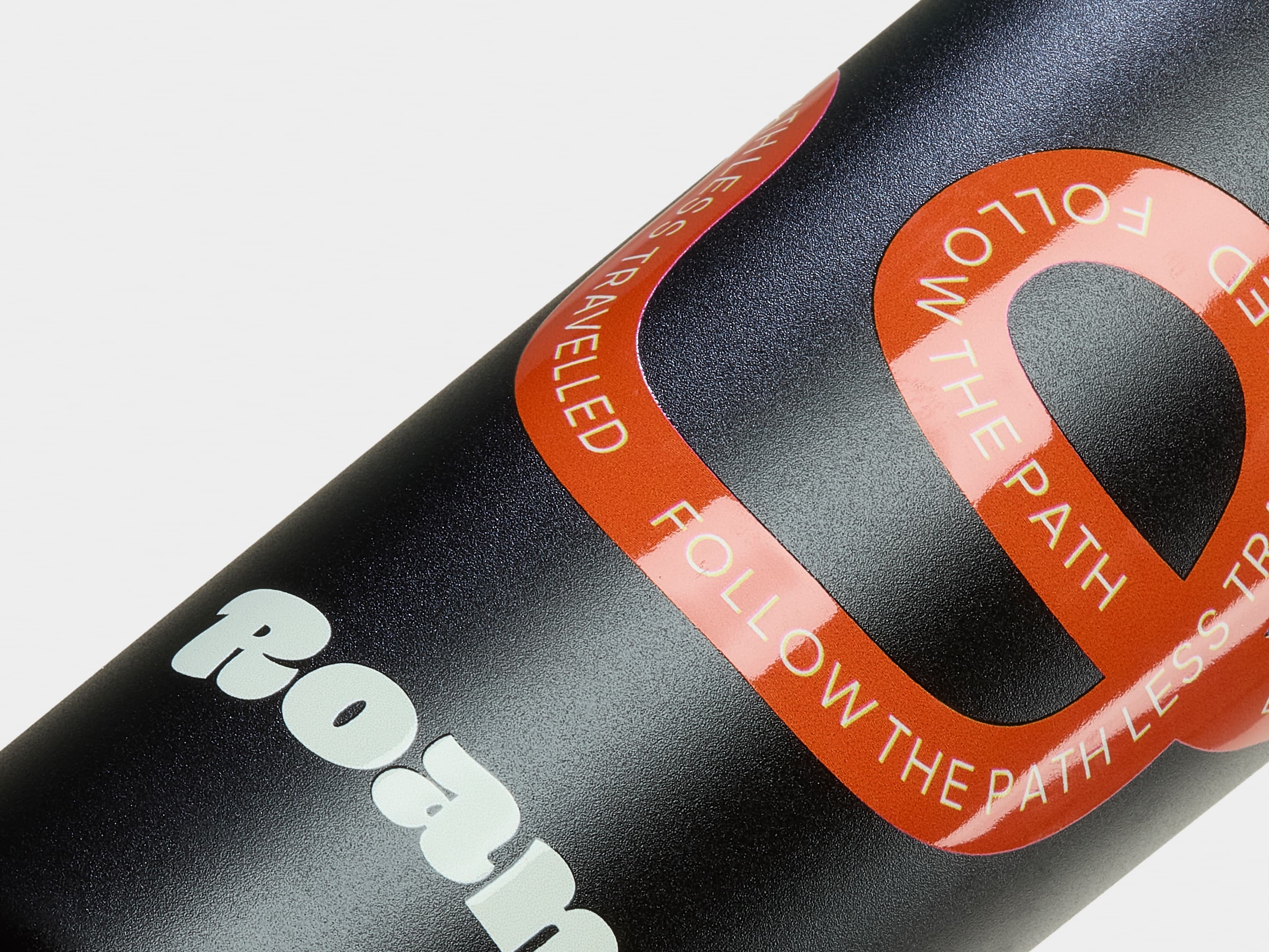 A detail image of custom branding on a black water bottle.