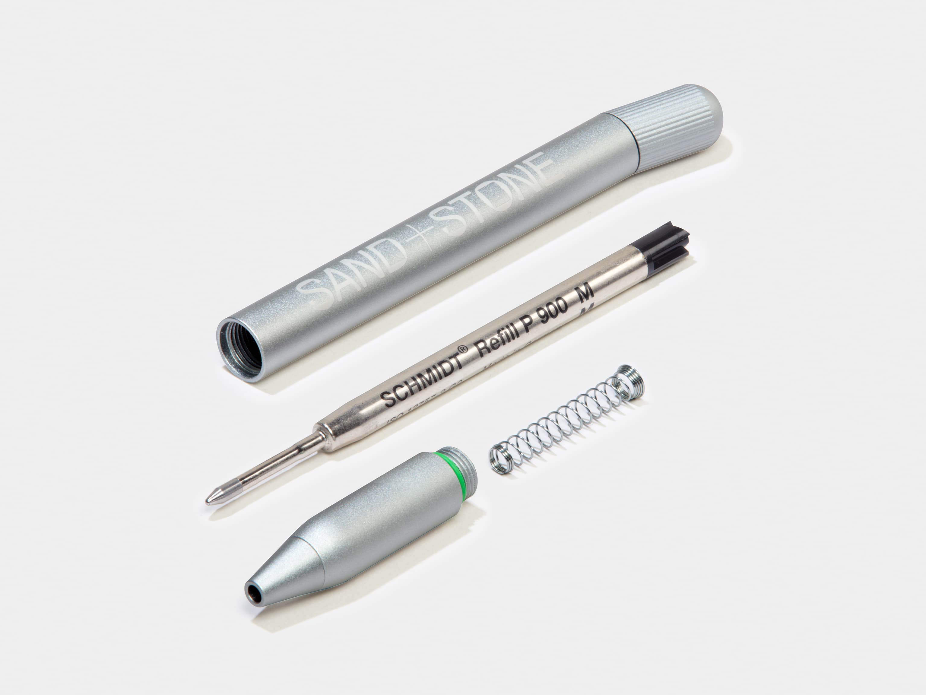 A disassembled custom aluminium pen.