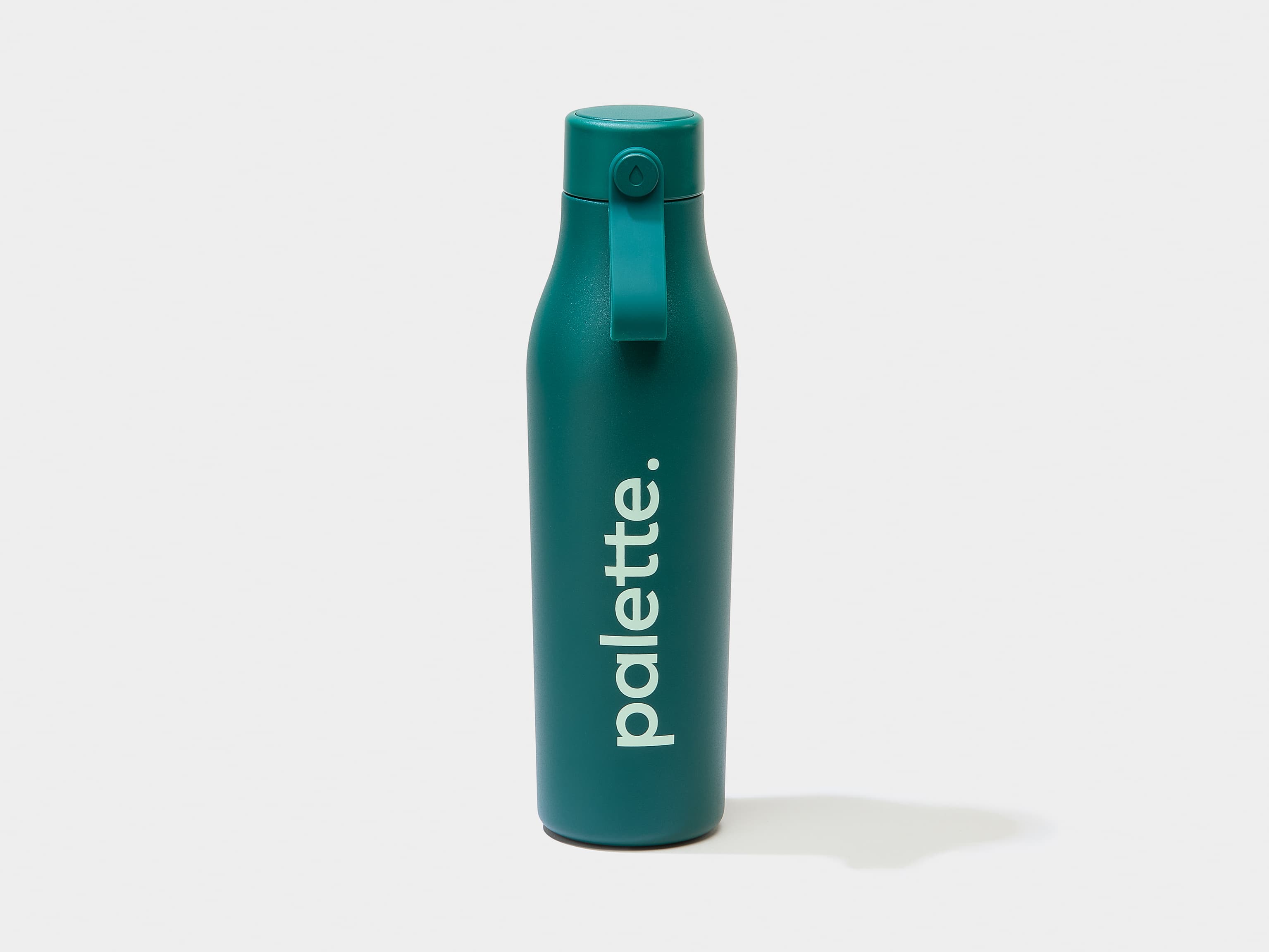 A green bottle with custom branding.