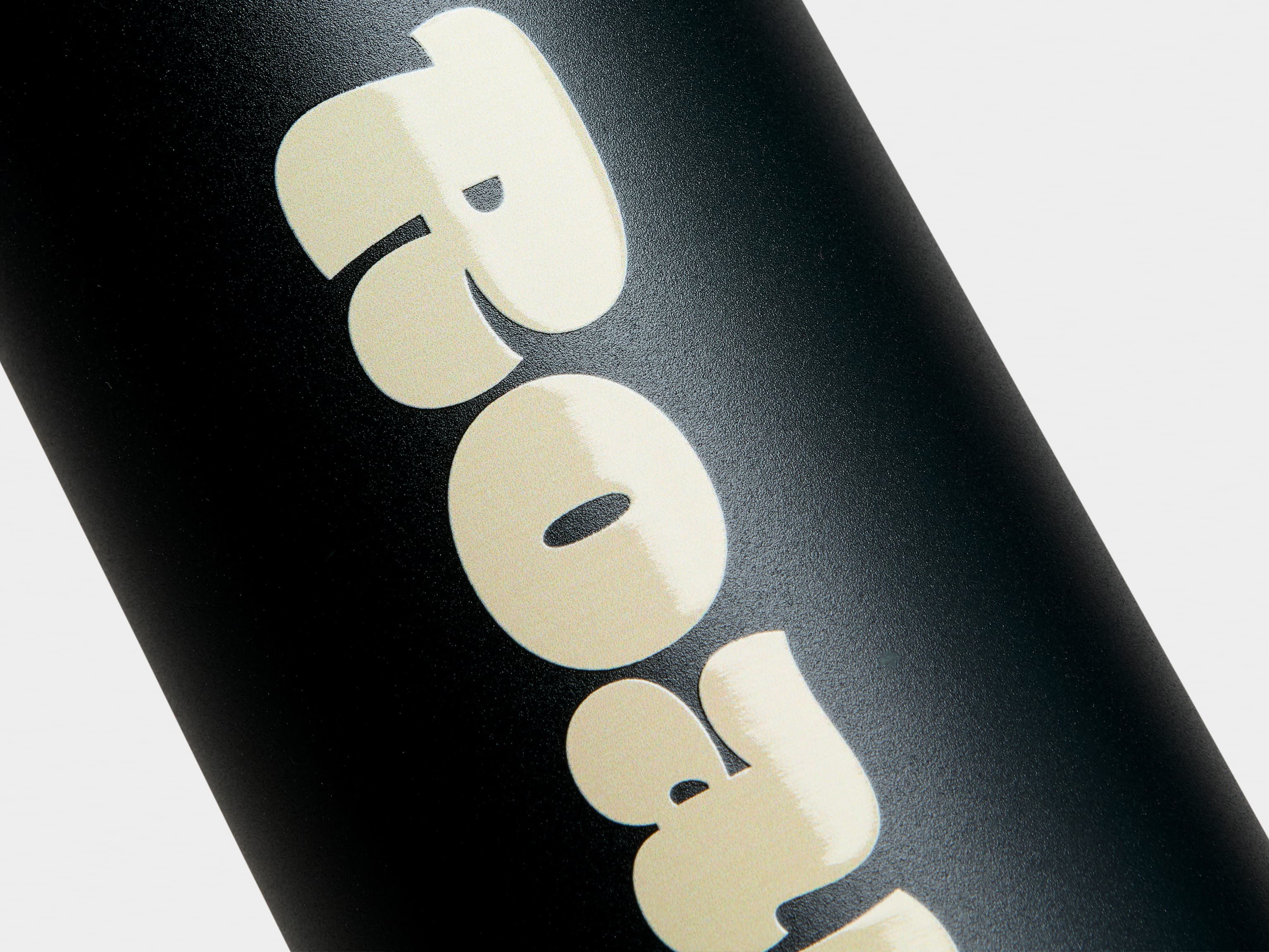 A close up image of the printing customization on a jet black MOO water bottle.