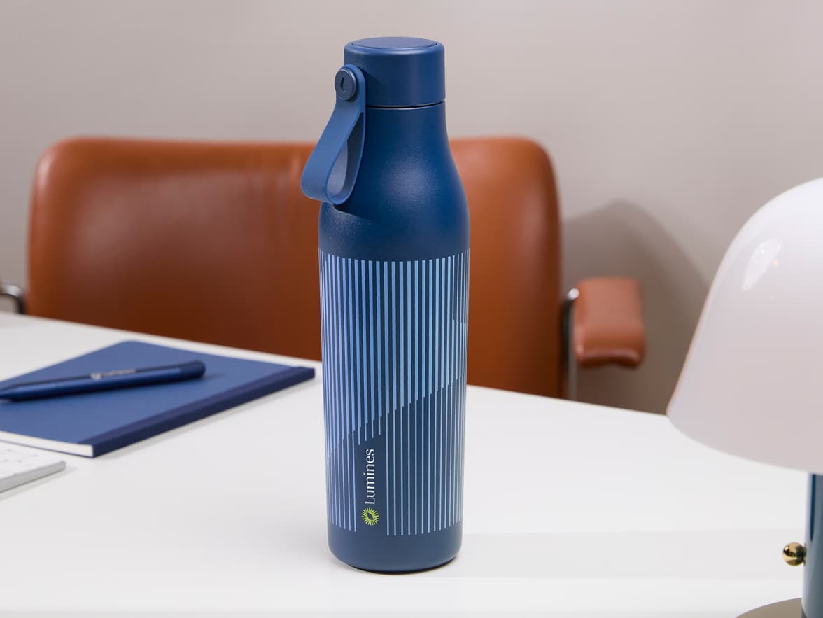 A custom blue water bottle with light blue branding.