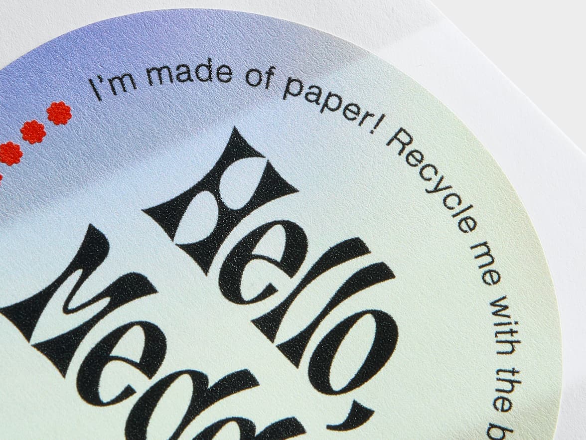 A close up image of a customized round matte paper sticker in size 3 inch.