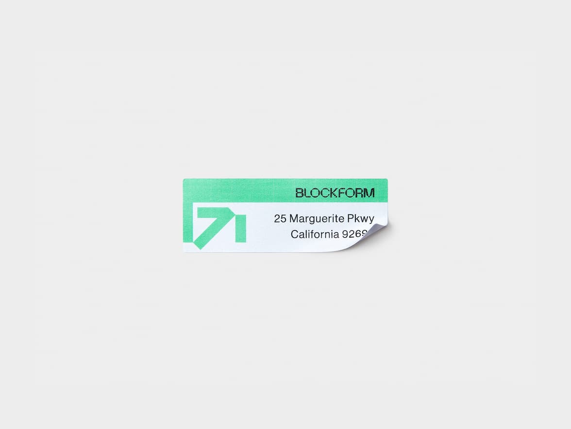 A rectangular coated sticker with bright green customization.