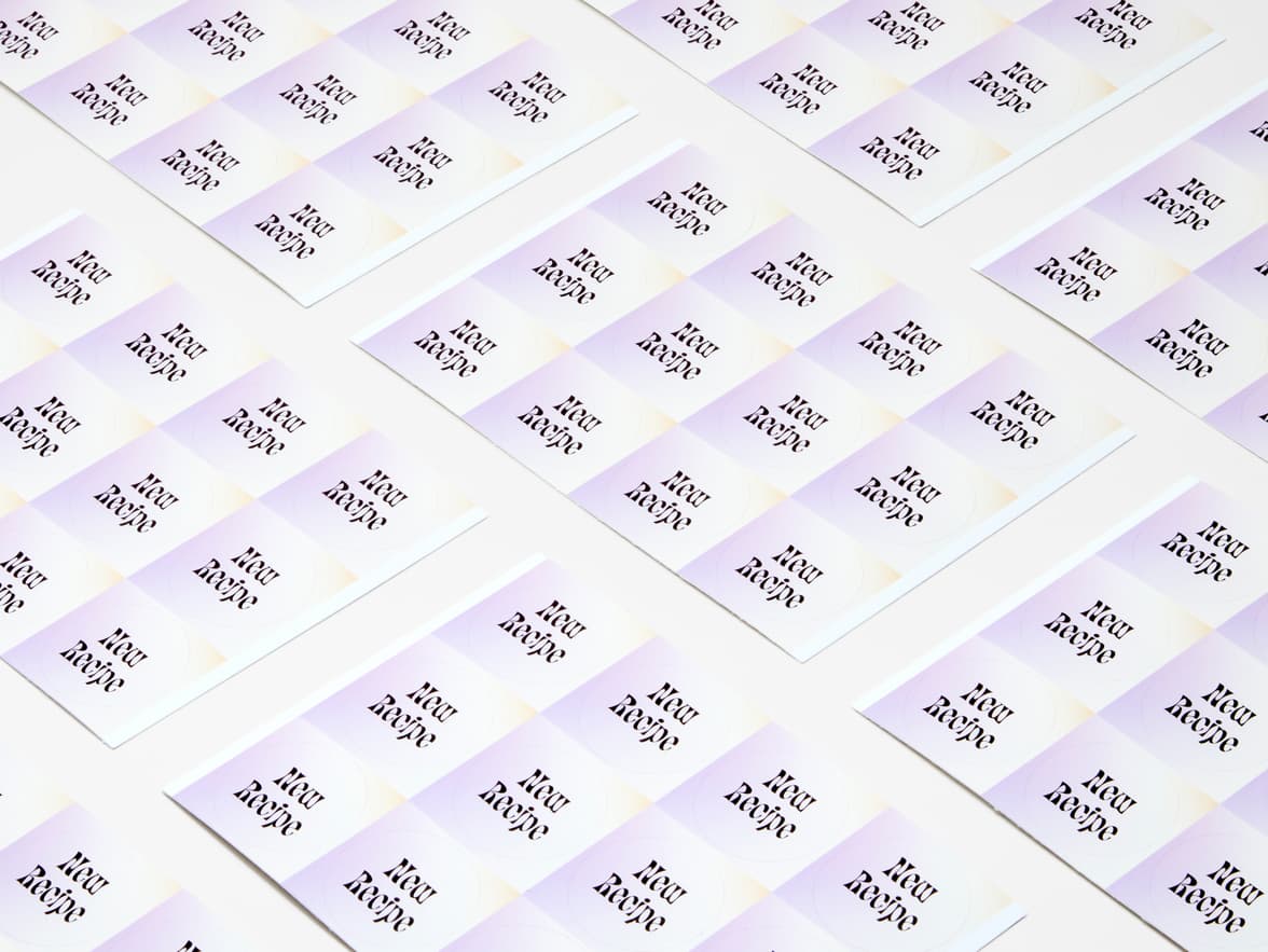A collection of lilac customized round stickers on sheets.