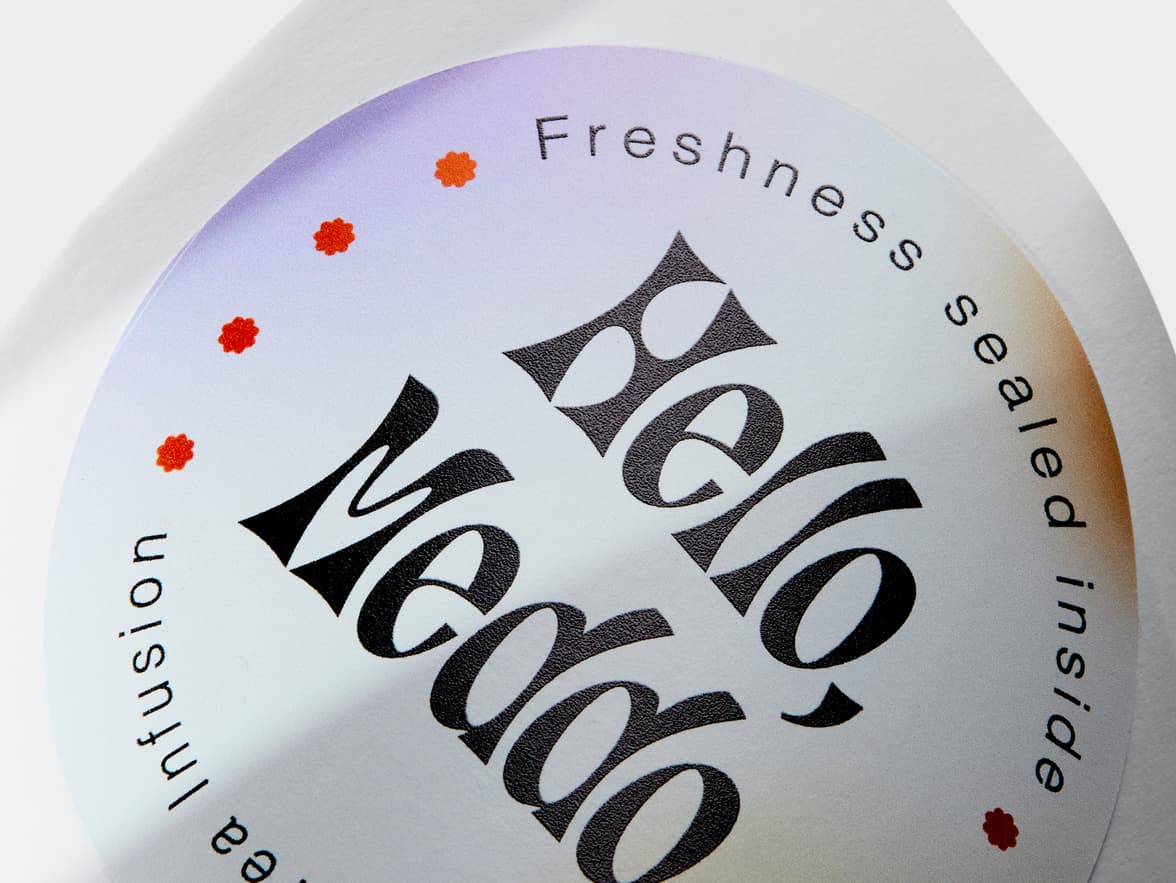 A close up of a multi coloured customized round coated stickers.